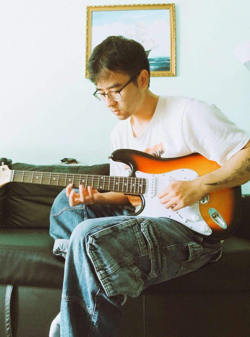 David playing guitar